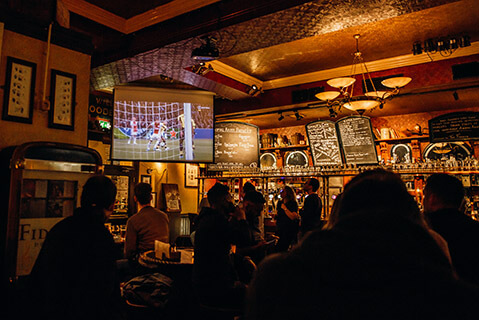 Big screens showing football