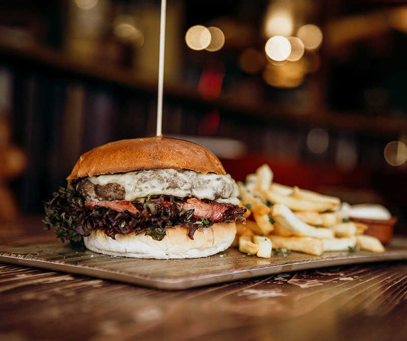 A burger and fries at the Fiddler